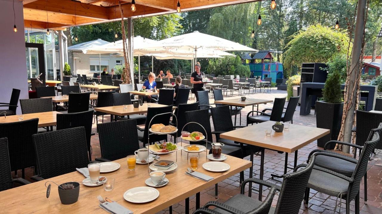 Hotel Zur Heidebluete Hambühren Esterno foto